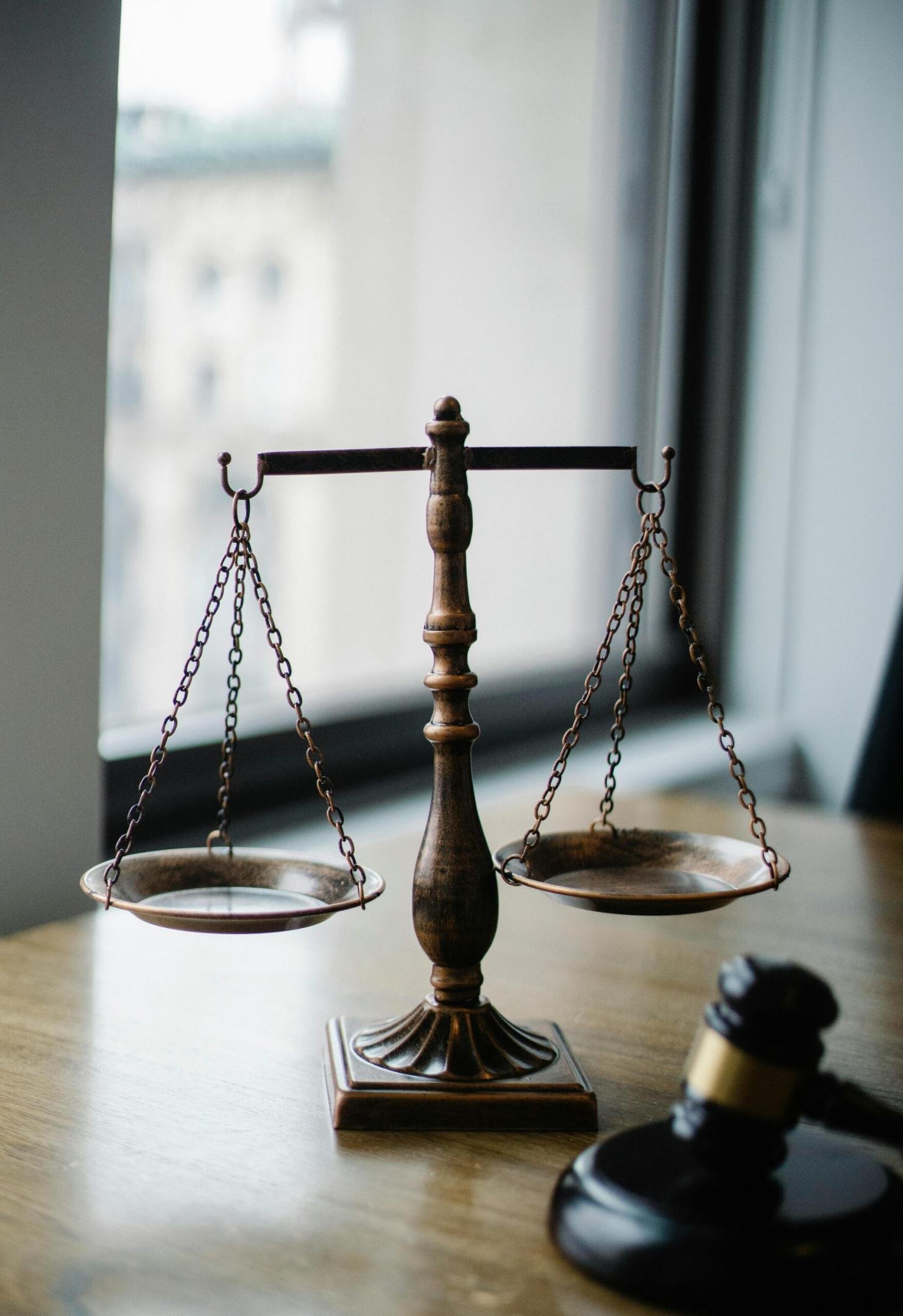 Balance and hammer of court